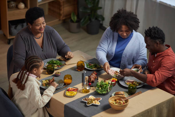 istock Family Enjoying Dinner Together at Home 2081375875