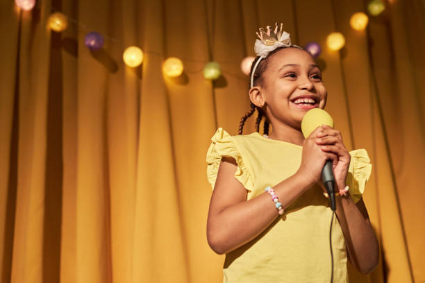 istock Black Girl Giving Home Show Performance 2081375898