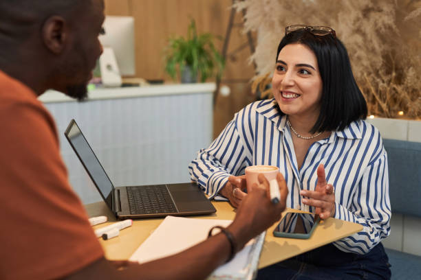 Young woman in business meeting at coffee shop