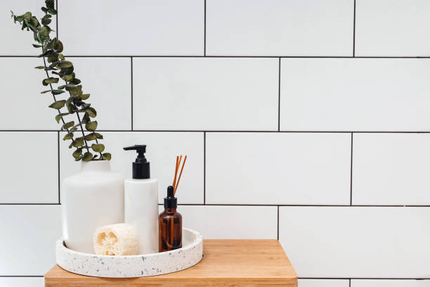 istock Cosmetics and eucalyptus branches on small wooden table, home spa 2081399696