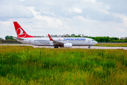 Passenger plane on the airport runway. Turkish Airlines aircraft TC-JVT. Boeing 737-8F2. Ukraine, Kyiv -28 May 2021.