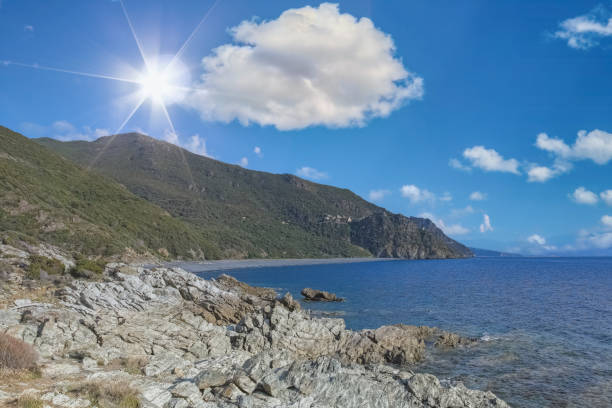 Corsica, aerial view of the Nonza beach, with black pebble, in the cap Corse