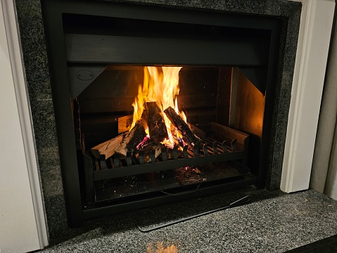Natural gas insert fireplace with large mantel concept