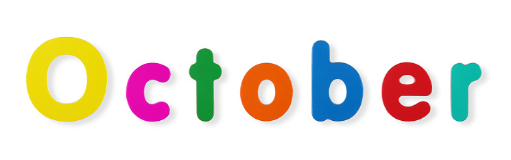 An October word in coloured magnetic letters on white with clipping path to remove shadow