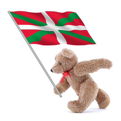 A Basque Lands flag being carried by a cute teddy bear
