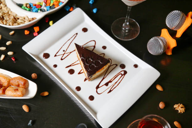 A delectable piece of cake sitting on a plate, ready to be enjoyed.