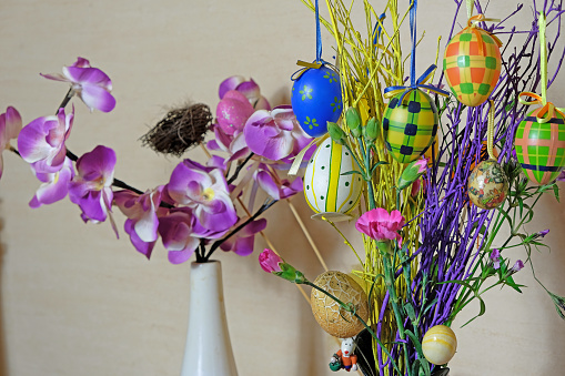 Decoration for Easter, Easter eggs on dyed birch branches