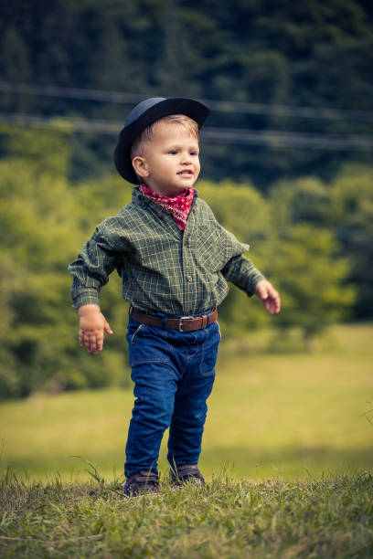 istock Little Cute Boy in Western Costume 2081623631