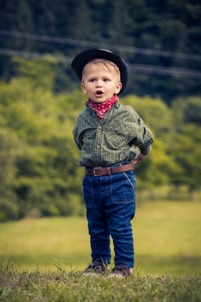 istock Little Cute Boy in Western Costume 2081623632