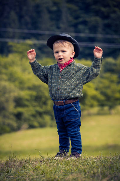 istock Little Cute Boy in Western Costume 2081623633