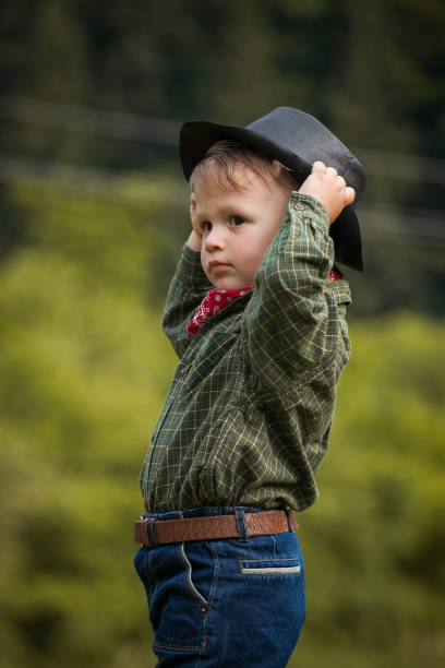 istock Little Cute Boy in Western Costume 2081624159