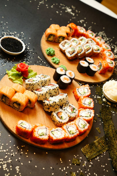 Assorted Sushi Platters Featuring Various Types of Sushi