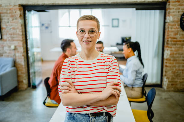 istock Smiling woman in the office 2081649665