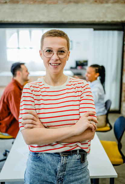 istock Smiling woman in the office 2081651809