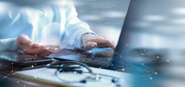 istock Doctor works on the Global Medical Network at a computer. 2081683123
