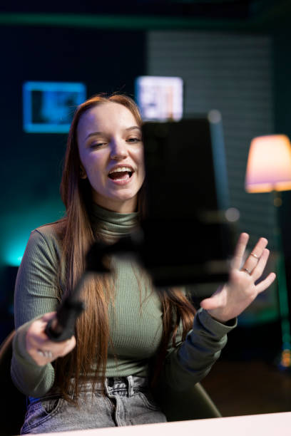 istock Upbeat influencer recording vlog for internet channel with phone camera 2081704254