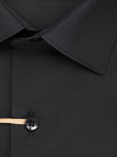 istock Close-up of a button placket on a black shirt 2081716530