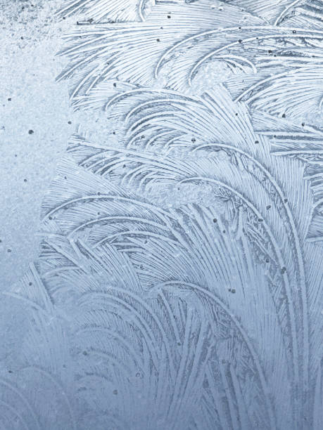 istock Winter frost patterns on glass. Ice crystals or cold winter background. 2081717077