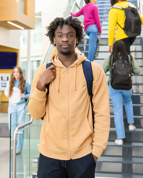istock Young black male college student smiling at camera 2081732703