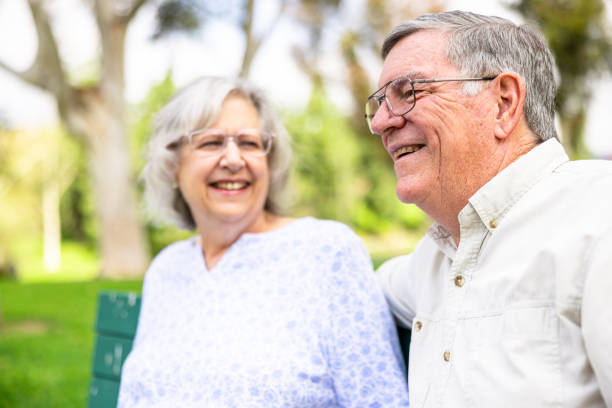 istock Senior couple relaxing together at the park 2081749634