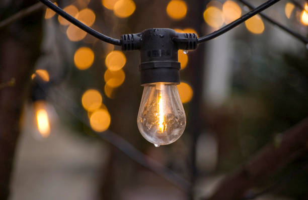 istock Close-up of illuminated light bulbs. 2081758266
