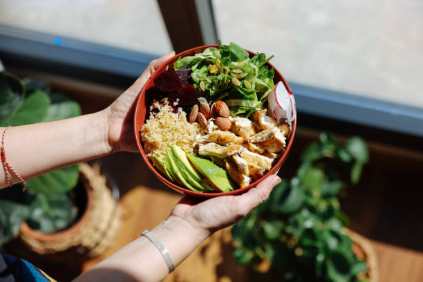 istock Holding a bowl of chicken salad 2081763843