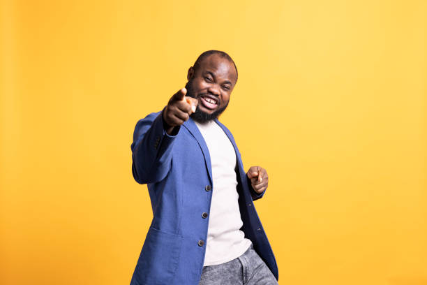 istock Flashy motivational speaker pointing finger to audience, studio background 2081769798