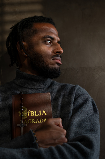 Man with Holy Bible (Spanish Biblia Sagrada)