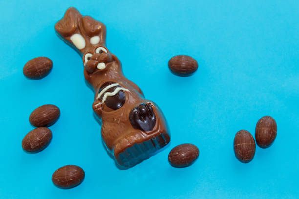 Easter chocolate bunny with eggs isolated on white background
