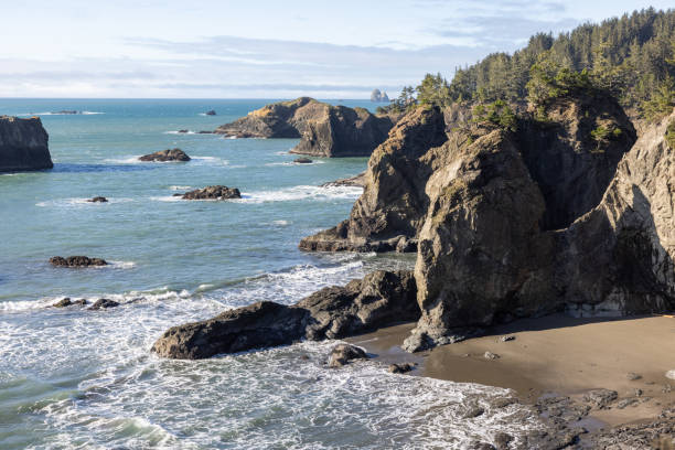 istock The ocean is calm and the rocks are jagged 2081826257