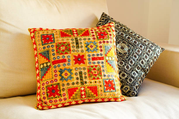 istock Traditional handcrafted Moroccan cushion with geometric design on the white sofa 2081854089