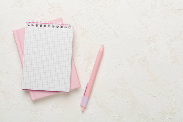 istock Notebooks with stationery on concrete background, top view 2081893533