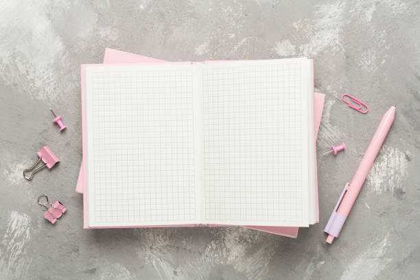istock Open notebook with stationery on concrete background, top view 2081893547