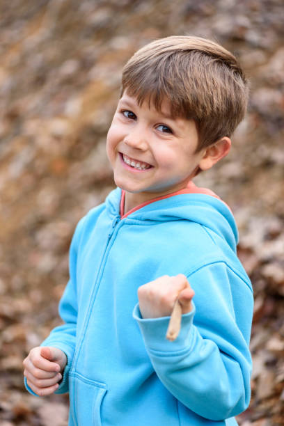 Child and nature. A beautiful boy in the forest.
