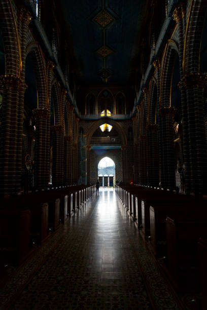 Jardin, Colombia - January 12, 2023: Parishioners pray at the Basilica of the Immaculate Conception