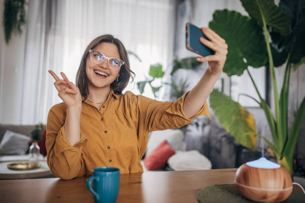 istock Young woman taking a selfie 2081962584