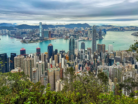 The clock tower looms up over the 48-year-old world-famous Edinburgh Place Star Ferry Pier in Central District, Hong Kong.