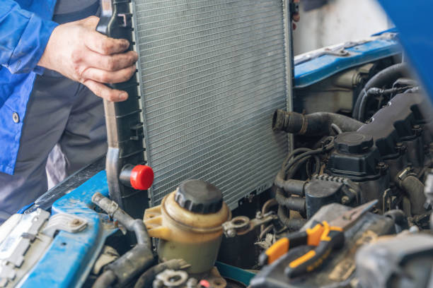 istock A man installs a new radiator in a car 2081963663