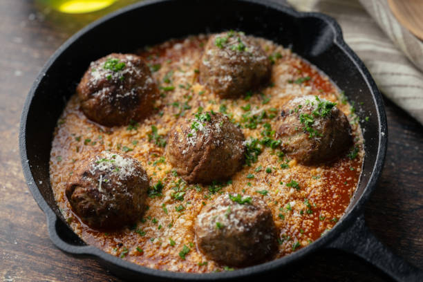 istock italian meat balls with tomato sauce and cheese 2082046738