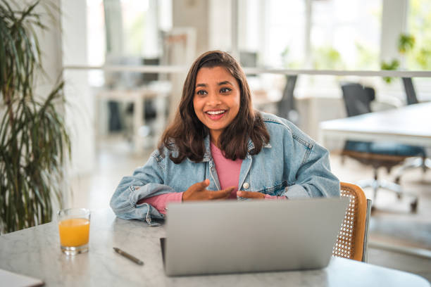 istock Young Asian Businesswoman Setting New Goals 2082167759