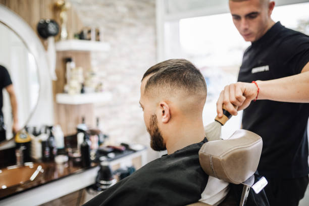 istock A client in my small barbershop 2082176951