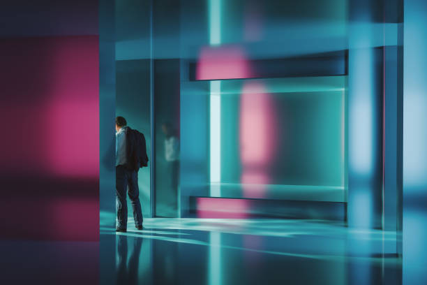 istock Businessman walking in futuristic corridor 2082188151