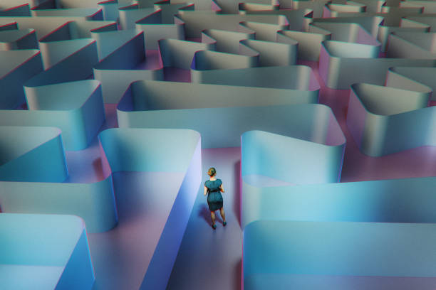 istock Businesswoman standing in abstract maze 2082189253