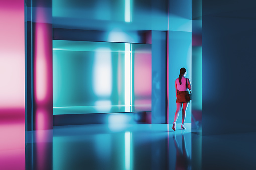 Woman walking in futuristic corridor. 3D generated image.