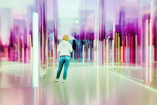 Young woman standing in futuristic glass maze. 3D generated image.