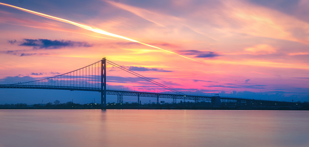 The Ambassador bridge links Detroit, Michigan with Windsor, Ontario.  It is one of the busiest trade routes in North America.