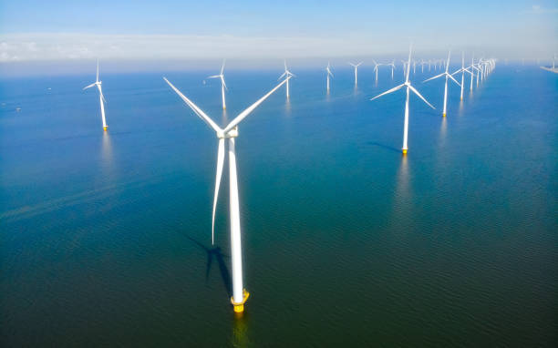 istock Windmill park in the ocean windmill turbines 2082269193