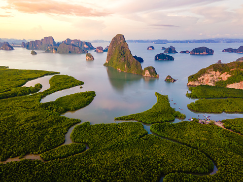panorama view of Sametnangshe viewpoint of mountains in Phangnga Bay with mangrove forest in the Andaman Sea with evening twilight sky, travel destination in Phangnga, Thailand