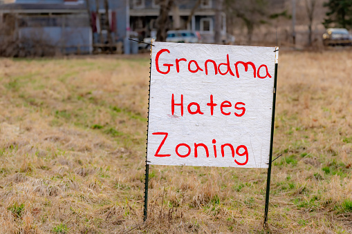 Grandma hates zoning sign in lawn, property, land, planning development
