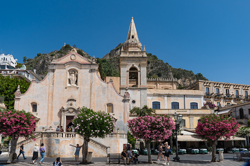 Taormina, Italy - August 9 2023: San Giuseppe Church and Belvedere and Corso Umberto street of Taormina at Main Square Piazza 9 Aprile